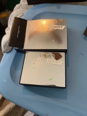 NARS Silver Mirrored Compact with Issist Logo